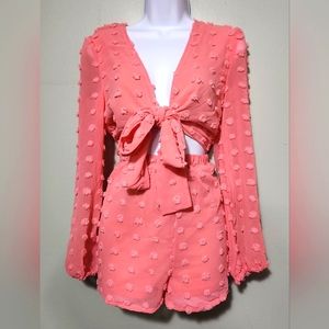 Coral textured rompers with tie in the front